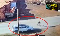 Otomobilin bisikletliye çarptığı an güvenlik kamerasına yansıdı