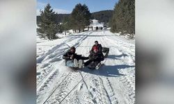 Çorum'da gençler lastiklerle kayarak karın tadını çıkardı