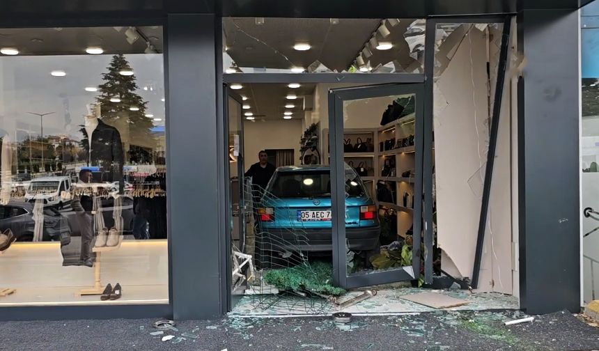 Çorum'da otomobiliyle mağazaya giren baba kız darpedildi